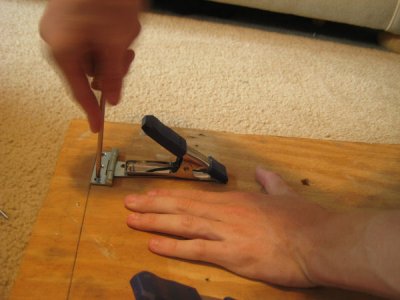 screwing the clamps to the board